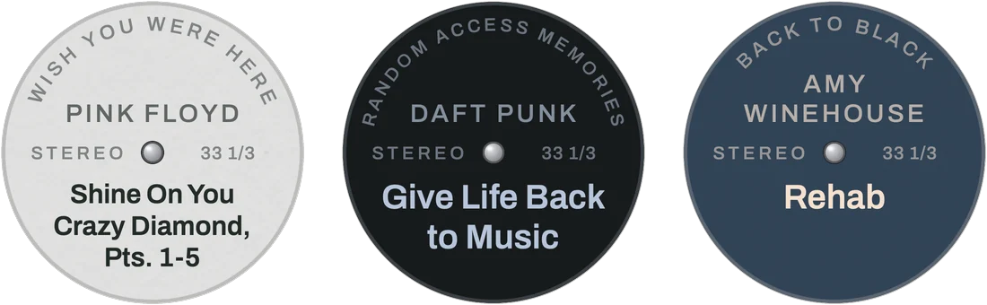 Three record labels side by side, each in colours taken from its album's cover: pale grey for Wish You Were Here by Pink Floyd, near-black for Random Access Memories by Daft Punk, deep blue for Back to Black by Amy Winehouse.